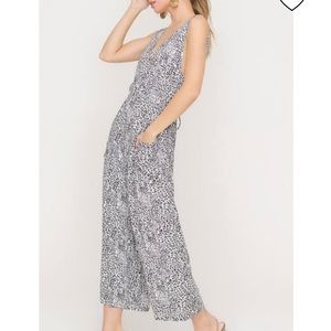 LUSH ANIMAL PRINT WIDE-LEG JUMPSUIT SIZE SMALL